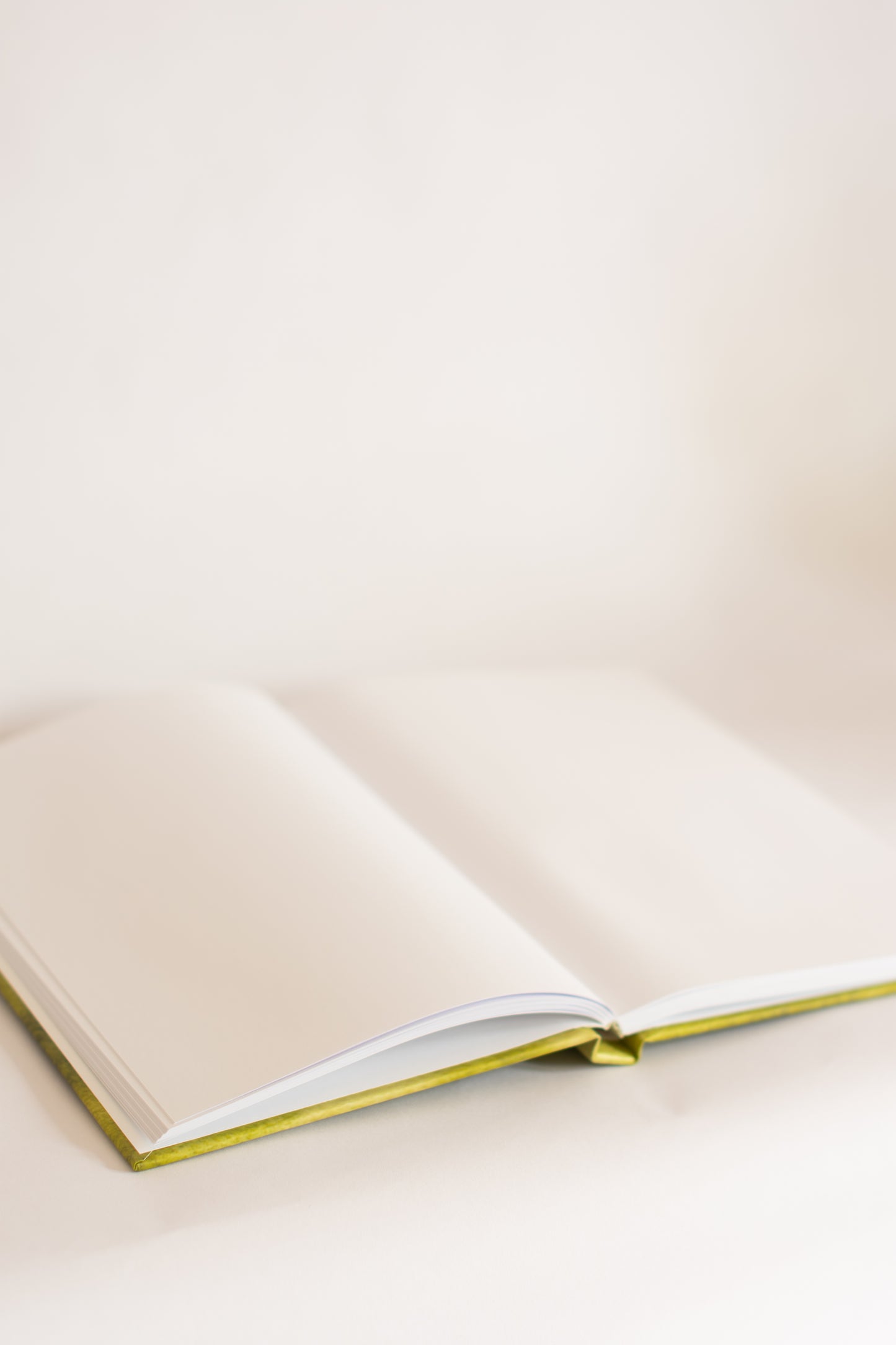 Open notebook on a light beige background